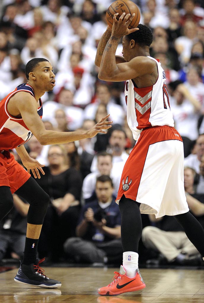 Apr 21, 2015; Toronto, Ontario, CAN; Washington Wizards forward Otto Porter (22) defends against Toronto Raptors guard DeMar DeRozan (10) in the third quarter  in game two of the first round of the NBA Playoffs at Air Canada Centre. Wizards beat raptors 117 - 106. Mandatory Credit: Peter Llewellyn-USA TODAY Sports