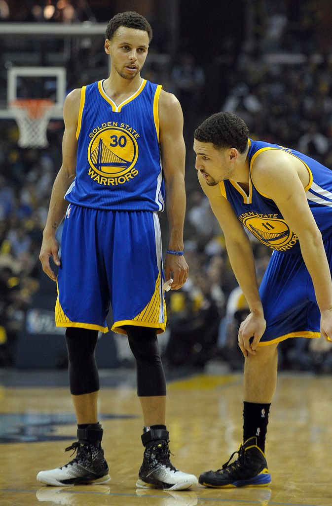 May 9, 2015; Memphis, TN, USA; Golden State Warriors guard Stephen Curry (30) and Golden State Warriors guard Klay Thompson (11) during the game against the Memphis Grizzlies in game three of the second round of the NBA Playoffs at FedExForum. Mandatory Credit: Justin Ford-USA TODAY Sports