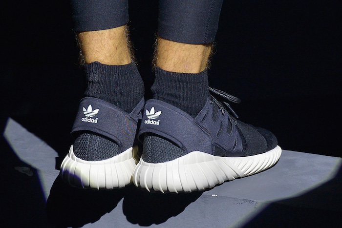 PARIS, FRANCE - JUNE 25:  Performer's shoes are seen during the Adidas Originals Tubular Paris Fashion Week Performance on June 25, 2015 in Paris, France.  (Photo by Dominique Charriau/Getty Images)