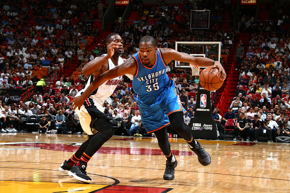 MIAMI, FL - DECEMBER 3: Kevin Durant #35 of the Oklahoma City Thunder handles the ball against the Miami Heat on December 3, 2015 at AmericanAirlines Arena in Miami, Florida. NOTE TO USER: User expressly acknowledges and agrees that, by downloading and or using this Photograph, user is consenting to the terms and conditions of the Getty Images License Agreement. Mandatory Copyright Notice: Copyright 2015 NBAE (Photo by Nathaniel S. Butler/NBAE via Getty Images)