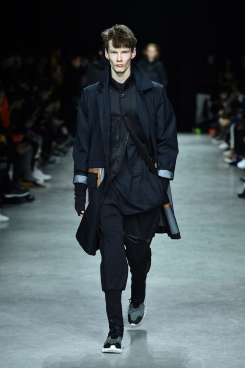 PARIS, FRANCE - JANUARY 22: A model walks the runway during the Y-3 Menswear Fall/Winter 2017 show at Palais De Tokyo on January 22, 2017 in Paris, France. (Photo by Pascal Le Segretain/Getty Images for Y-3)